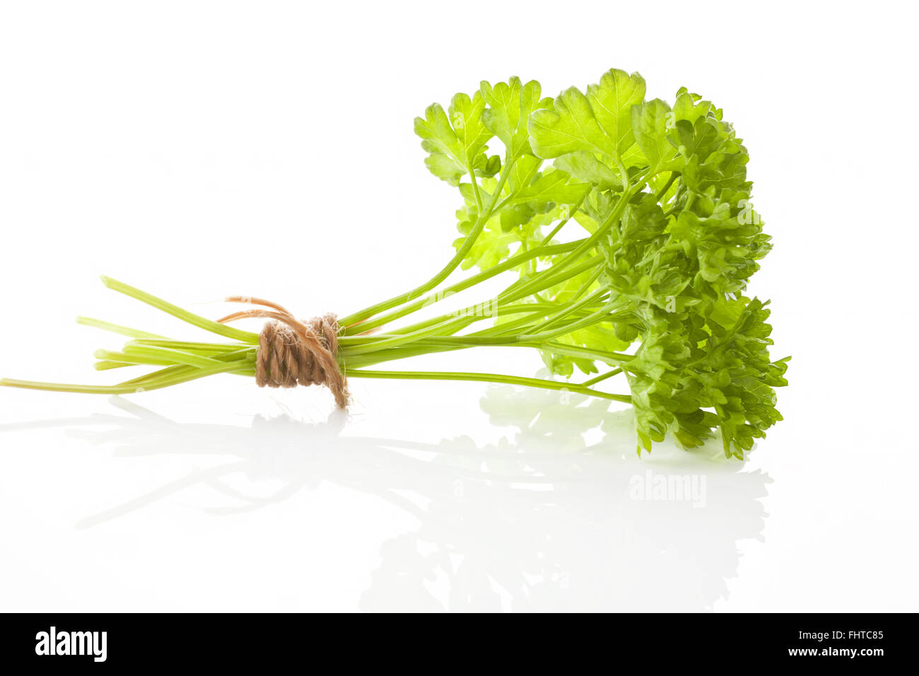 Parsley bunch isolated Stock Photo Alamy