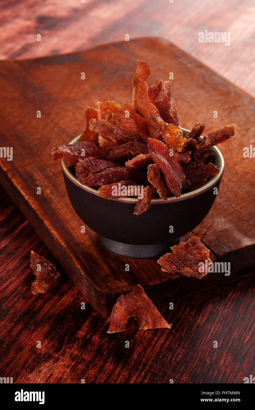 Beef jerky background Stock Photo - Alamy