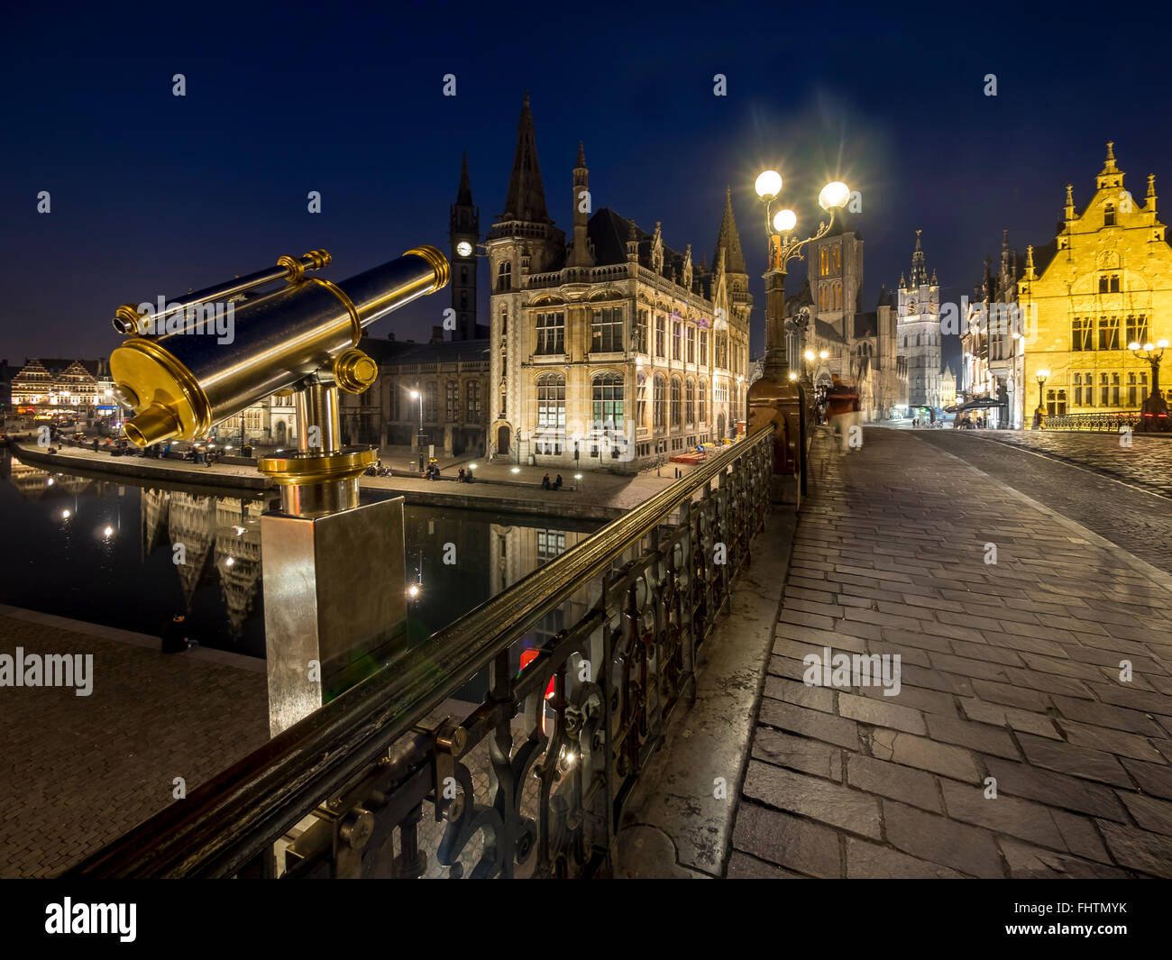 Belgium, Ghent, view from St. Michael Bridge to old town with St. Nicholas' Church and belfry at night Stock Photo