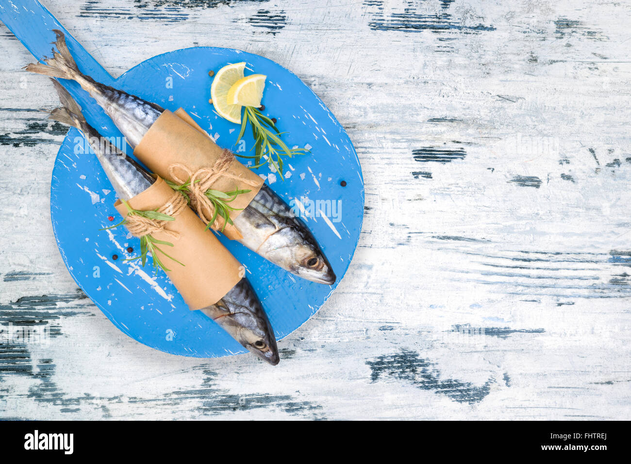Mediterranean fish eating Stock Photo - Alamy