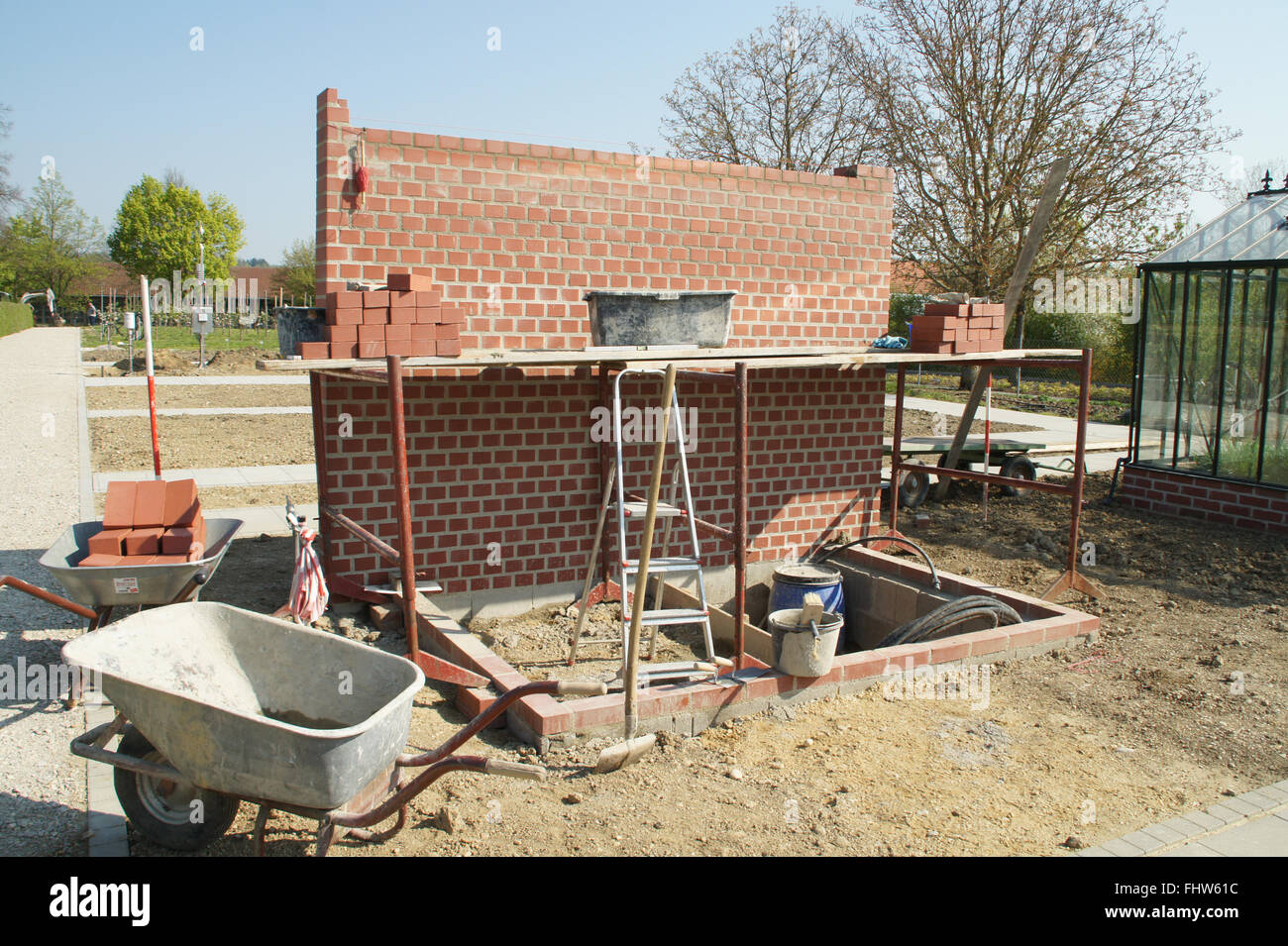 Building a greenhouse, Brickwall Stock Photo Alamy