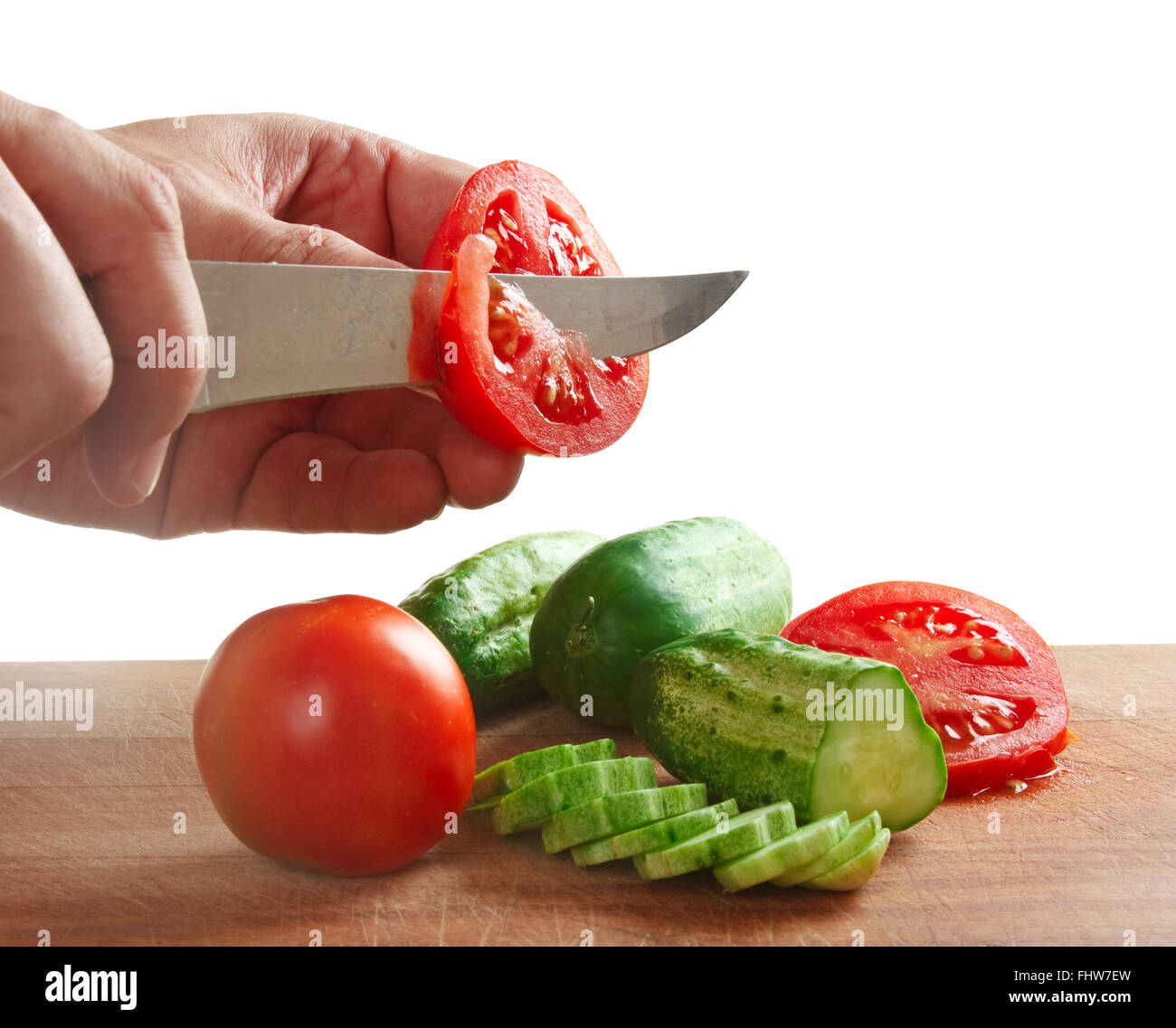 chop tomatoes and cucumbers Stock Photo Alamy