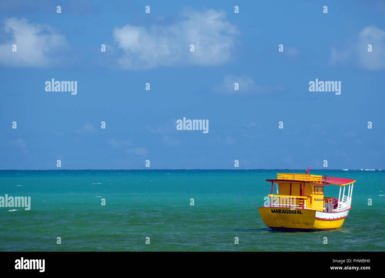 Tourist boat on the sea beach of Maragogi - Coast of Alagoas Stock Photo