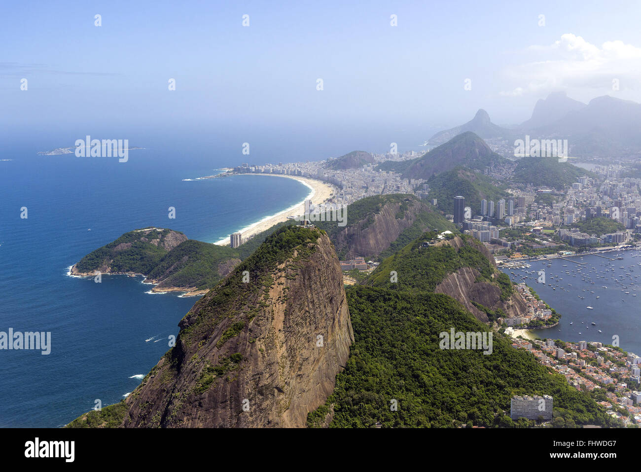 Aerial view of Sugar Loaf Mountain in the foreground and Copacabana beach in the background Stock Photo