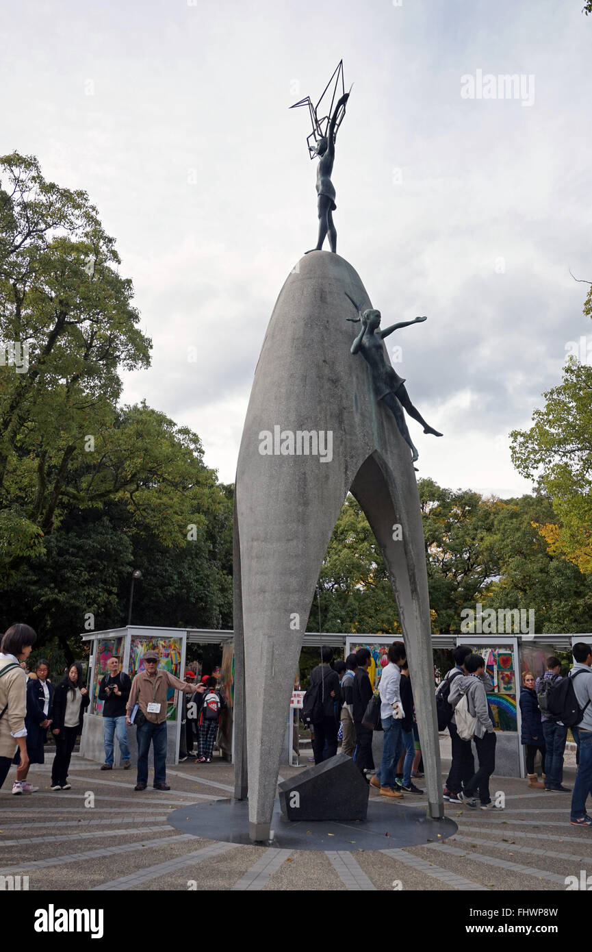 Visitors at the Children's Monument Hiroshima Memorial Peace Park, Japan Stock Photo