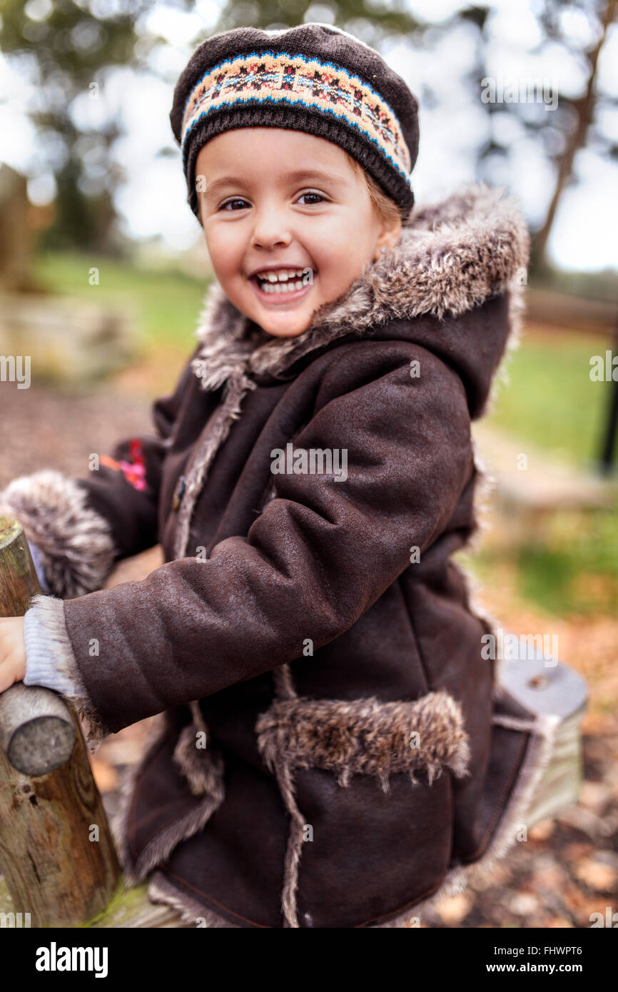 Portrait of happy little girl on a playground in autumn Stock Photo - Alamy