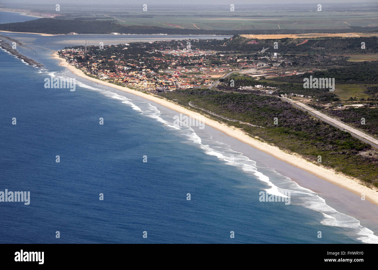 View of the town of Barra de Sao Miguel - Niquim lies between the River and the Atlantic Ocean Stock Photo