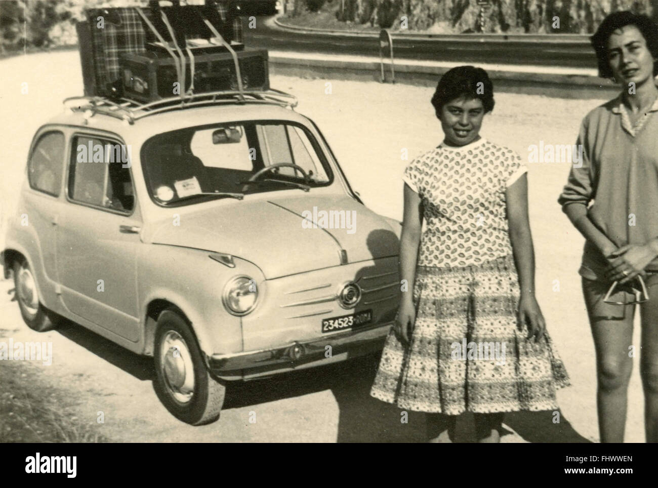 Departing with FIAT 600 loads of suitcases, Italy Stock Photo