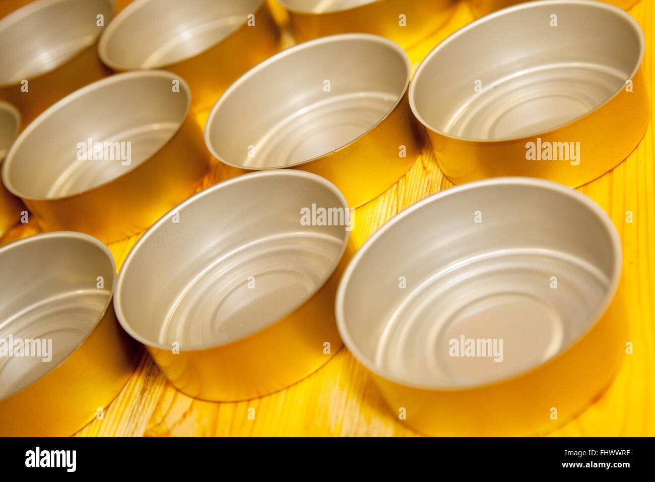 empty food tins prepared for filling Stock Photo