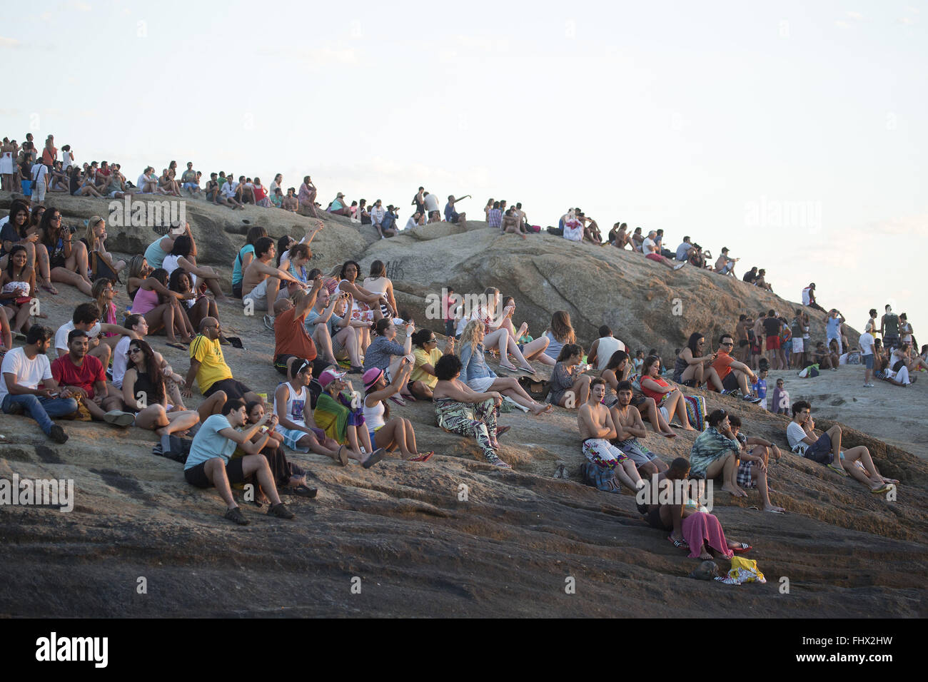 Tourists at Arpoador Rock Stock Photo