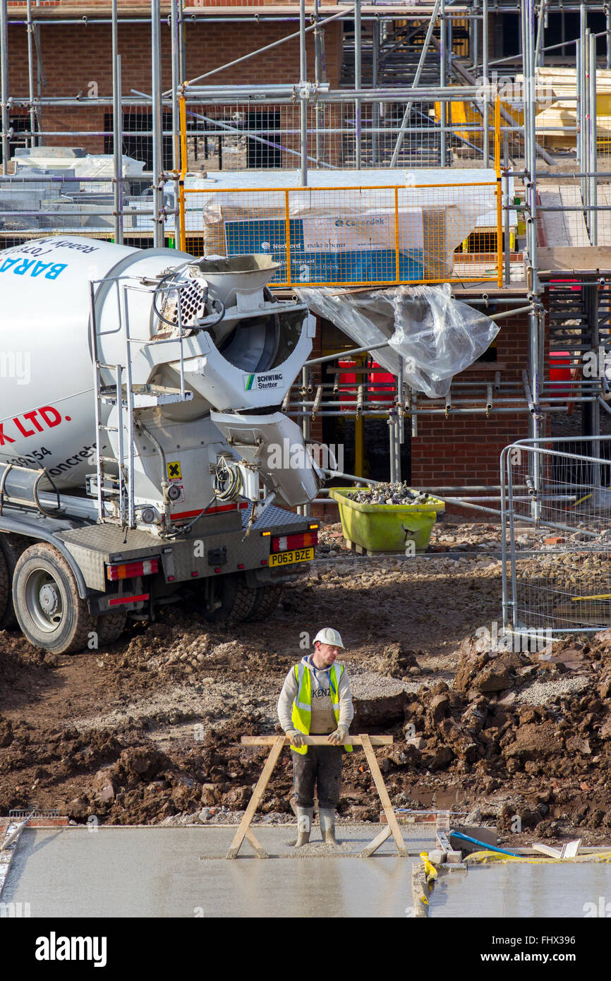 Laying concrete foundations, House building in Chorley, by Persimmon, Wimpey Homes, and Redrow