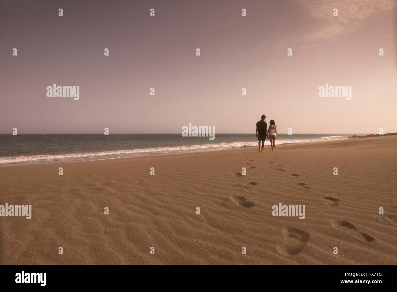Back view young couple in love at hi-res stock photography and images ...