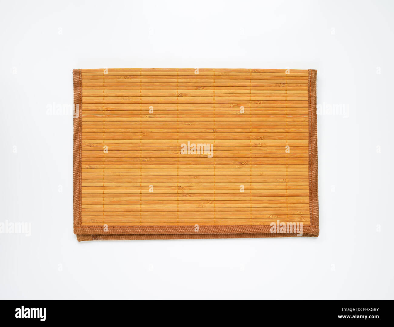 Bamboo place mat with brown border Stock Photo