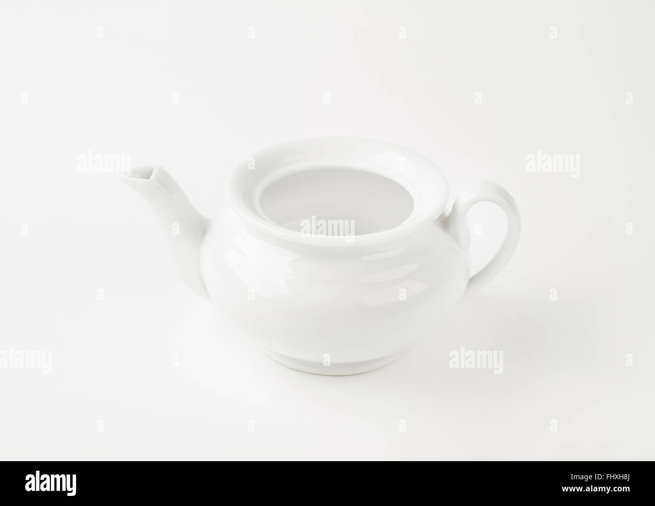 Empty white porcelain teapot without a lid Stock Photo Alamy