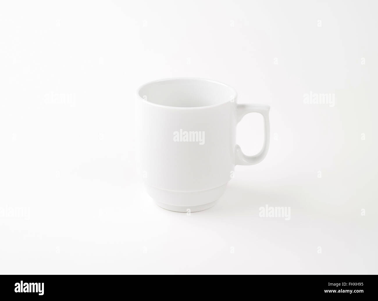 empty white mug on white background Stock Photo