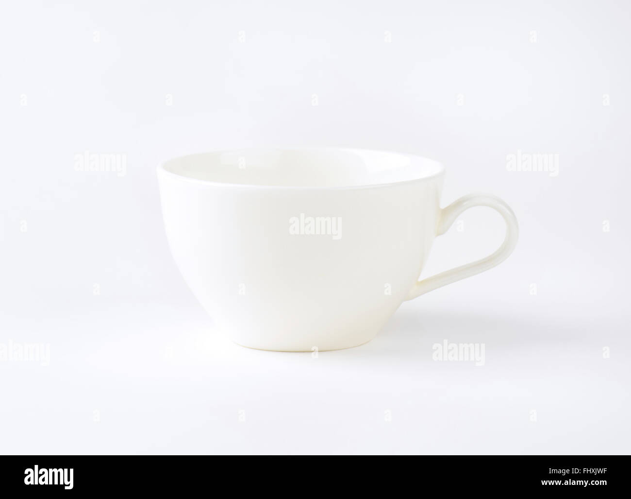 empty tea cup on white background Stock Photo Alamy