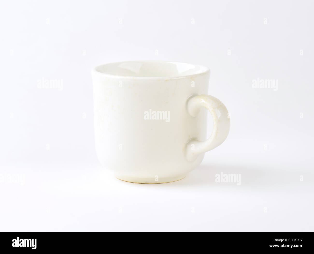 empty white mug on white background Stock Photo - Alamy