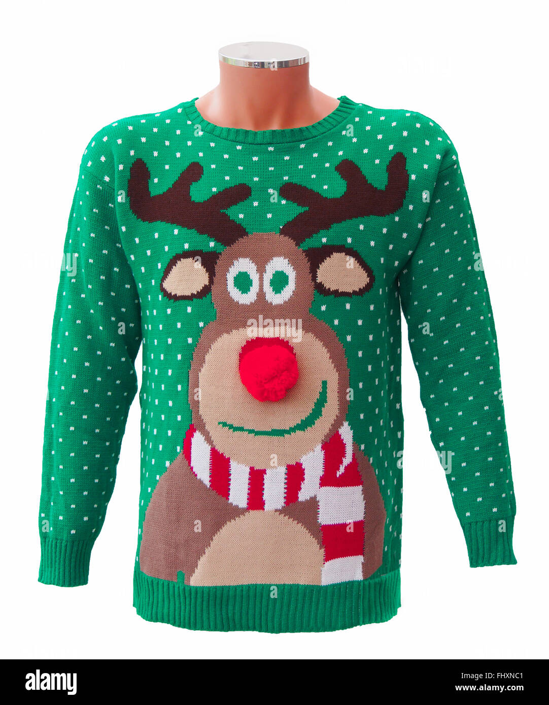 Green knitted adults' Christmas jumper, featuring Rudolph the red nosed reindeer and snowflakes, isolated on a white background. Stock Photo