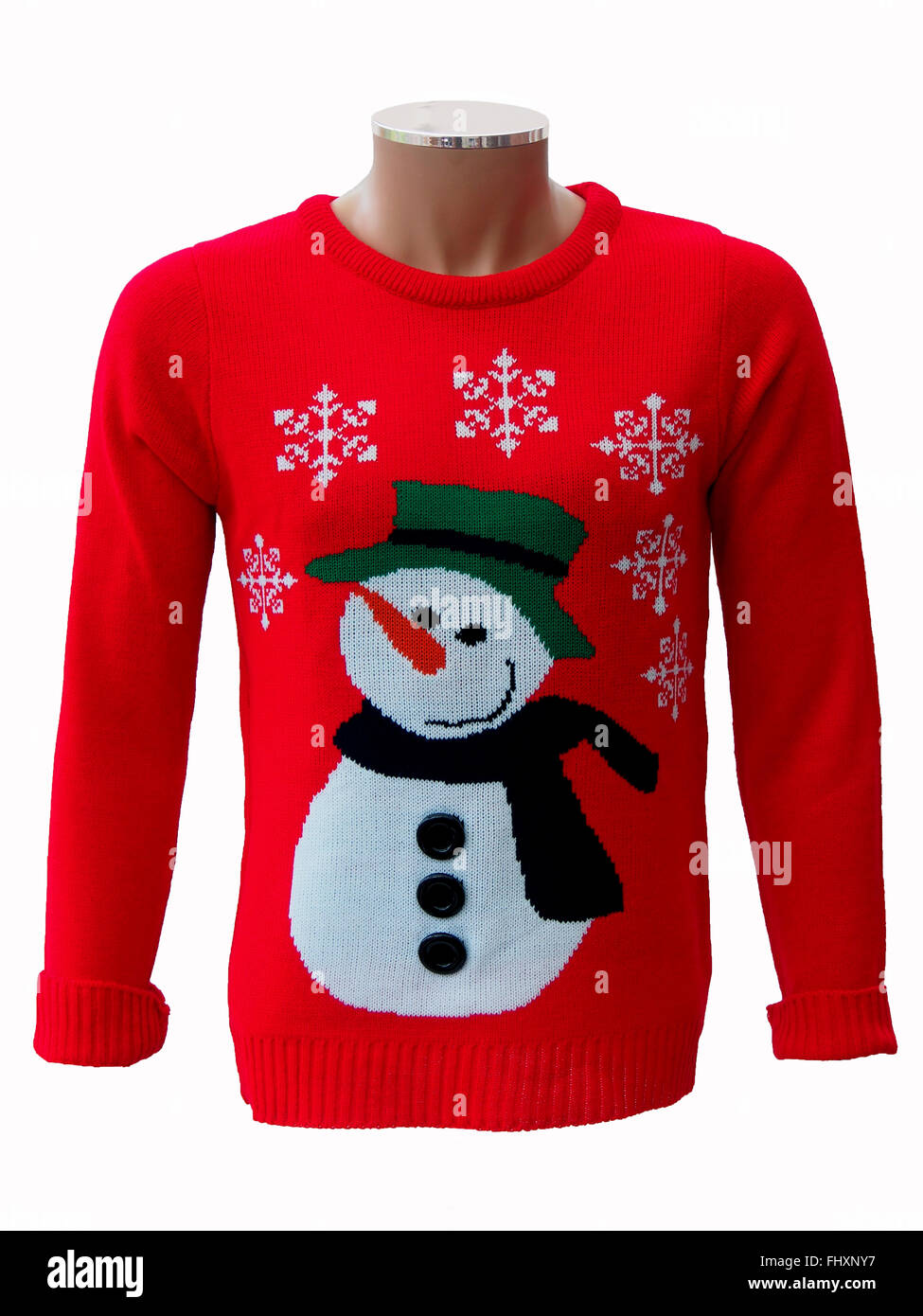 Red knitted adults' Christmas jumper on a mannequin, featuring a snowman and snowflakes, isolated on a white background. Stock Photo