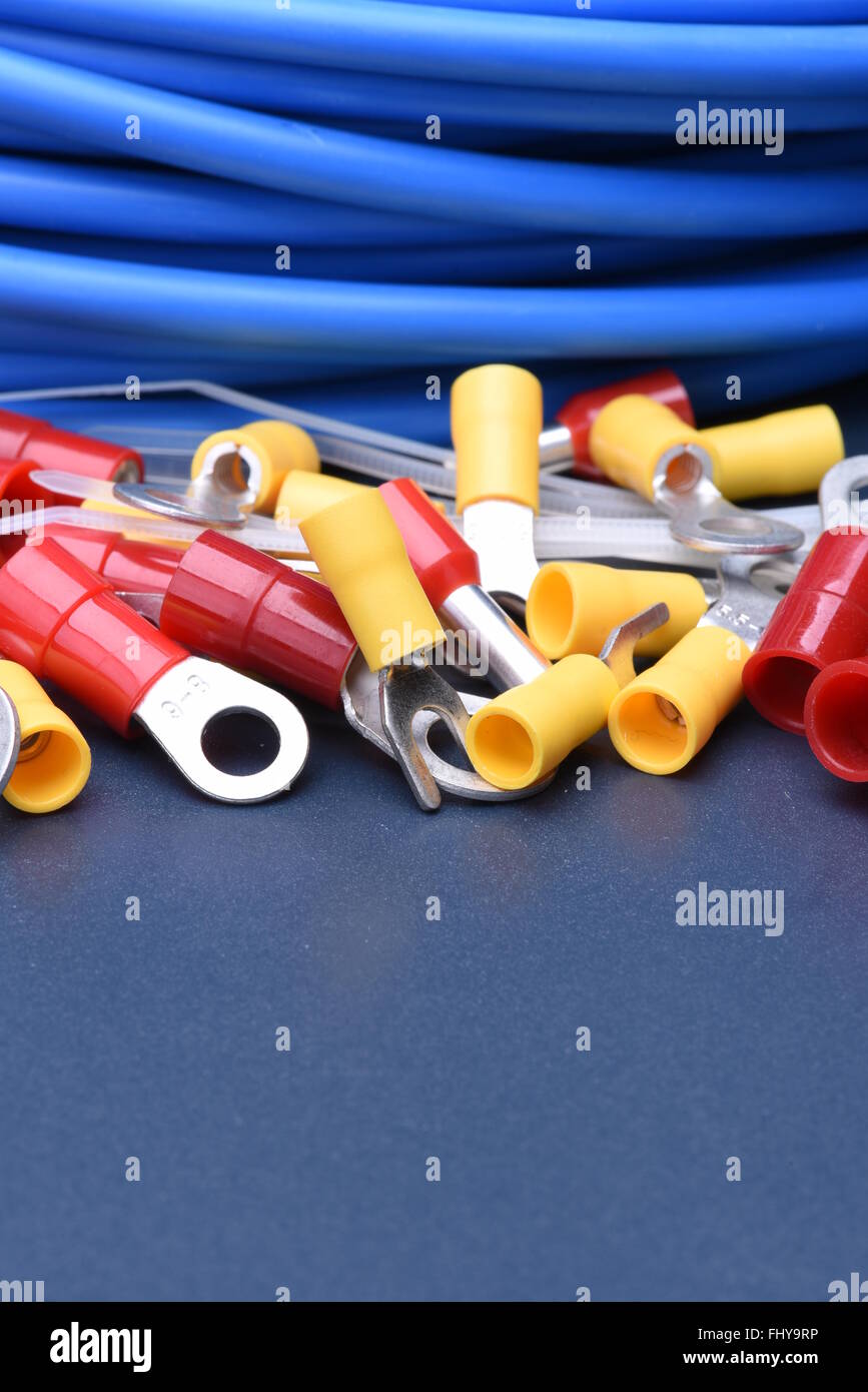 Terminal electrical accessories and cable on metal surface Stock Photo