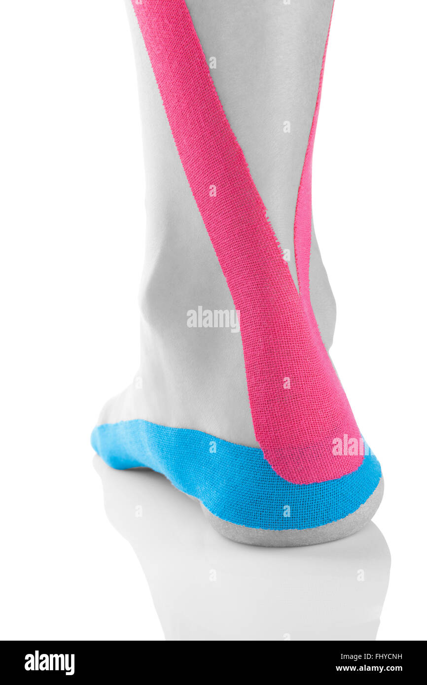 Kinesio tape on female heel isolated on white background. Chronic pain