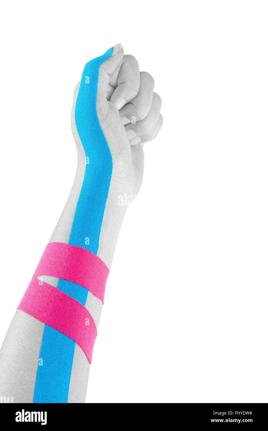 Kinesio tape on female hand isolated on white background. Chronic pain, alternative medicine. Rehabilitation and physiotherapy. Stock Photo