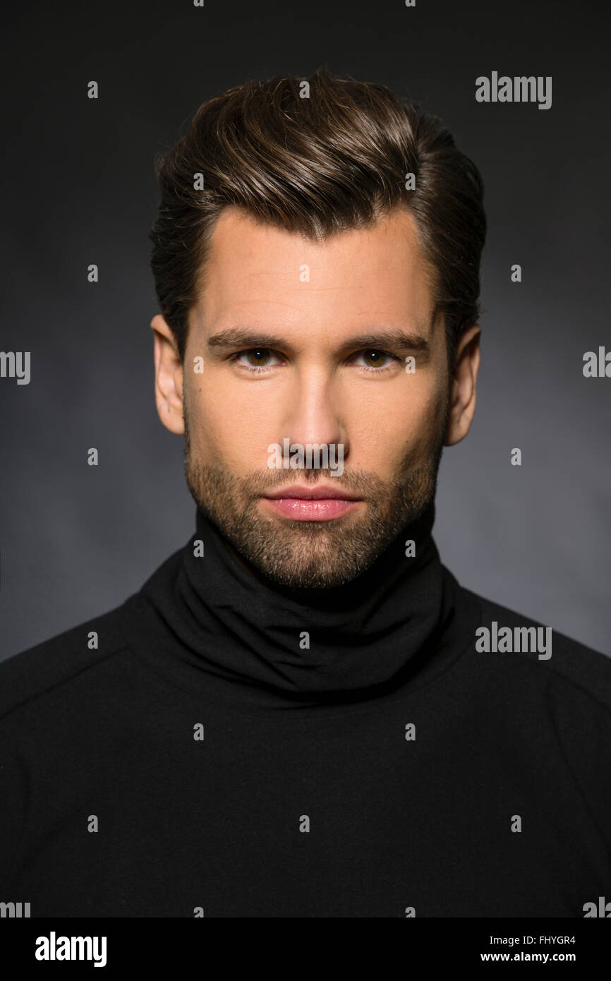 man wearing black turtleneck