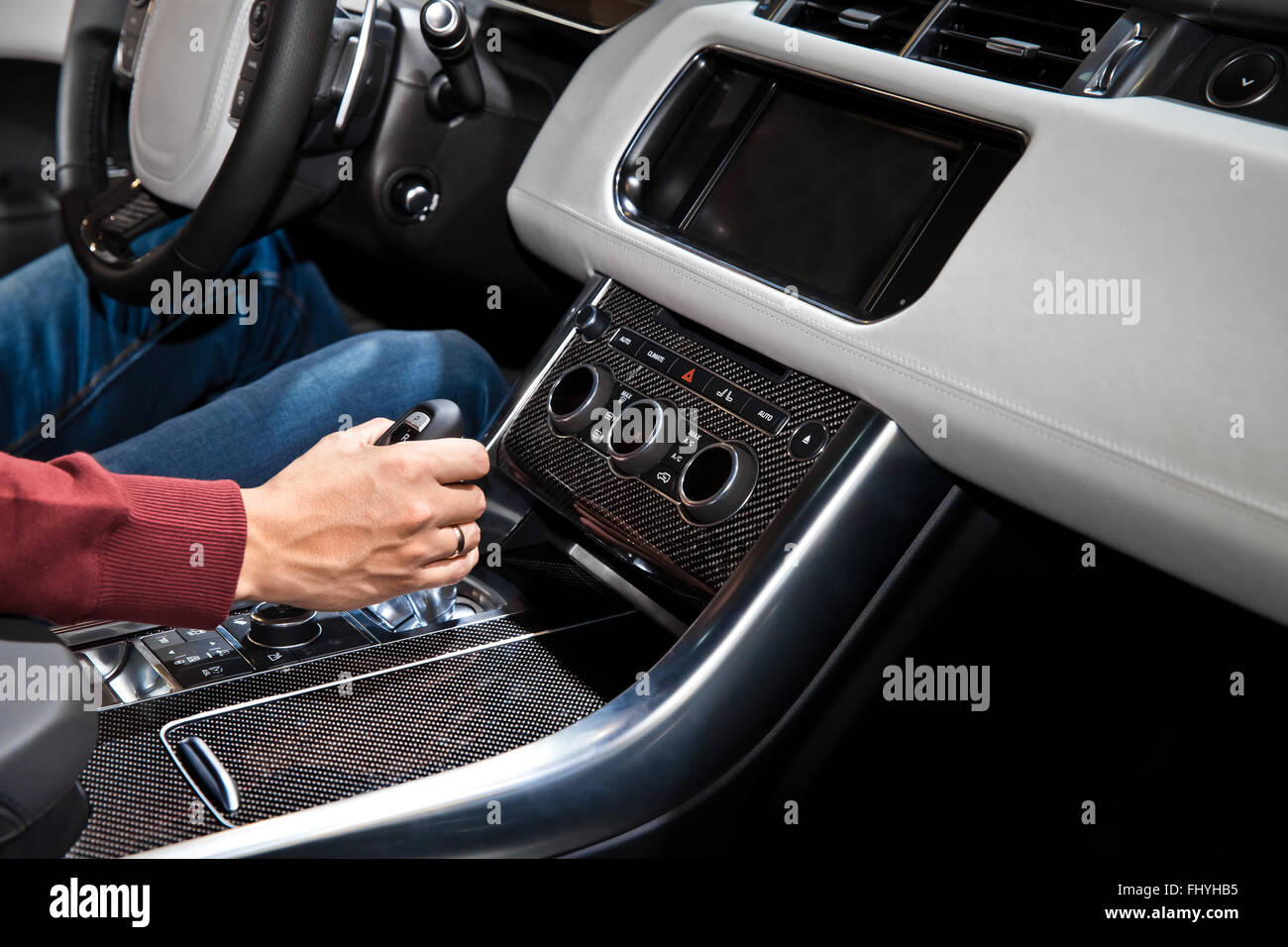Hand holding automatic transmission in car Stock Photo Alamy