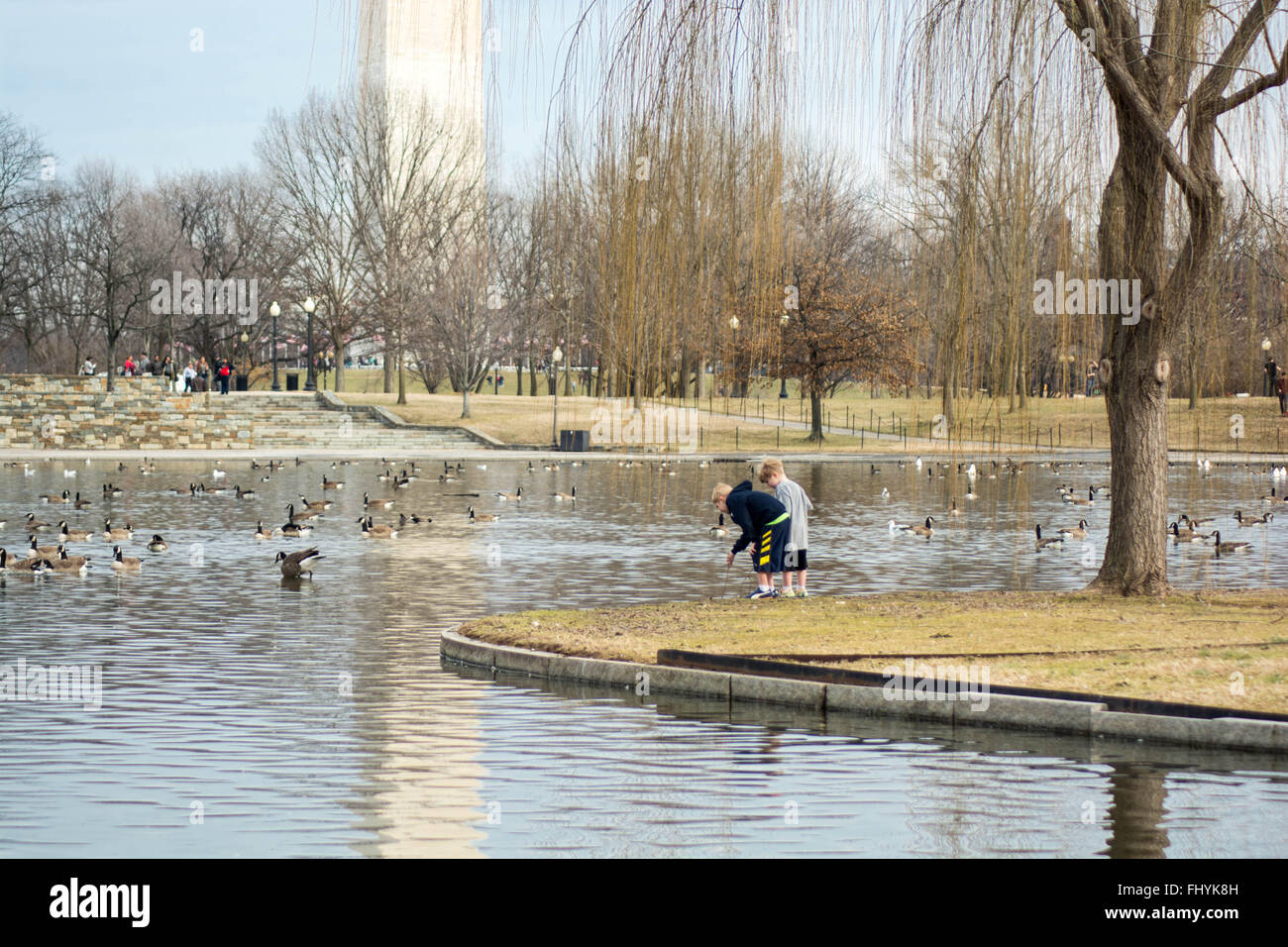 Boys playing in river hi-res stock photography and images - Alamy