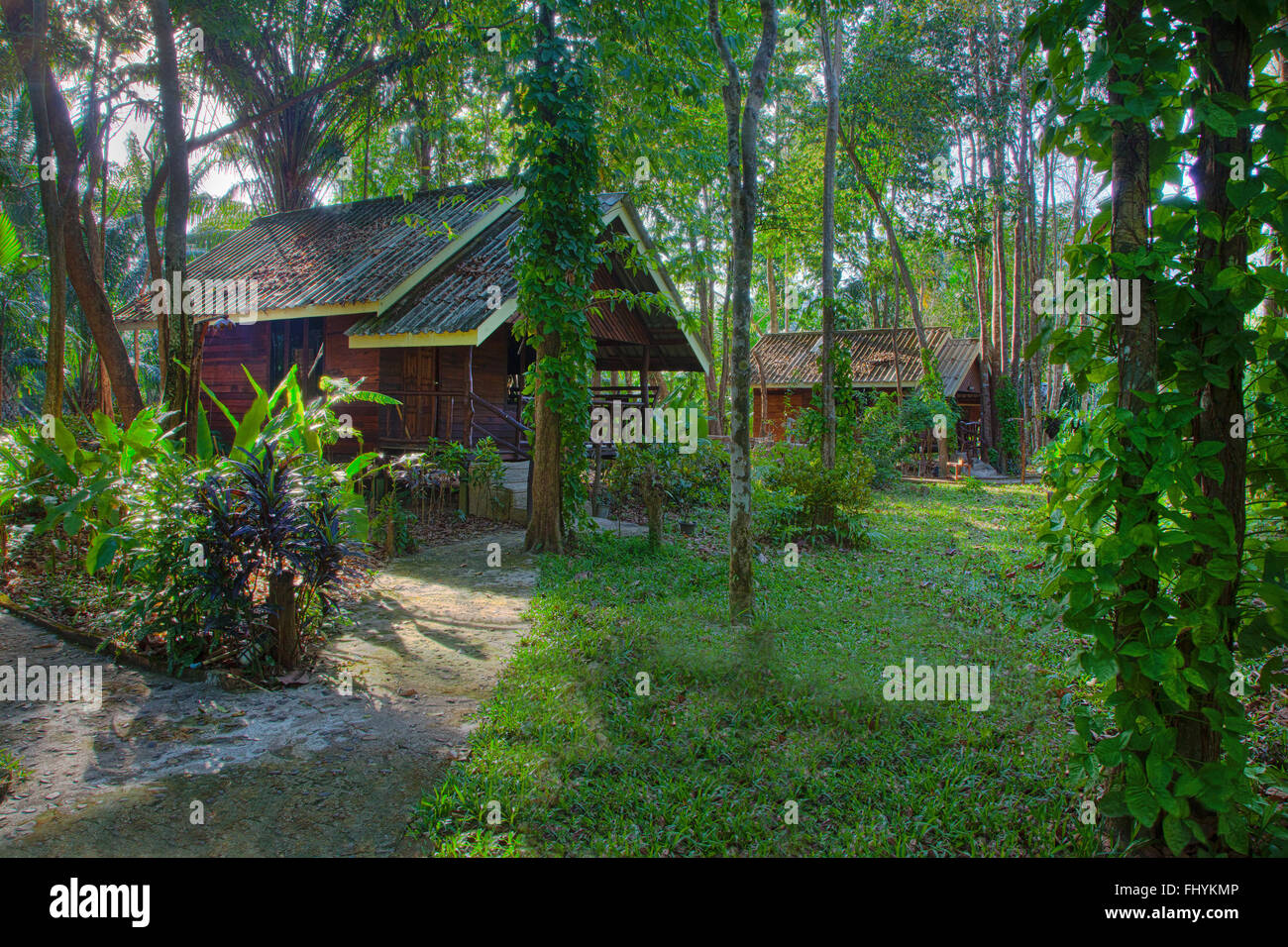 The RIVERSIDE COTTAGES in KHO SOK are a perfect place to stay to visit Kho Sok National Park - THAILAND Stock Photo