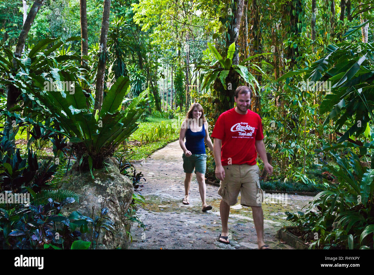 GUESTS enjoy the jungle setting at the RIVERSIDE COTTAGES in KHO SOK, a perfect place to stay to visit Kho Sok National Park - T Stock Photo