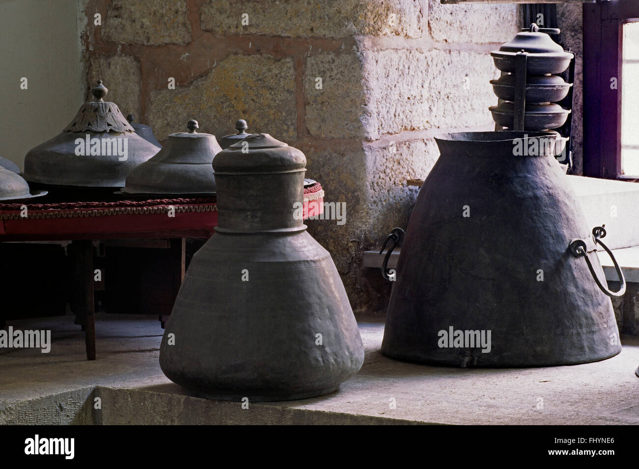 Iron pots & vessels from one of the many kitchens of Topkapi Palace (Ottoman Empire) - Istanbul, Turkey Stock Photo