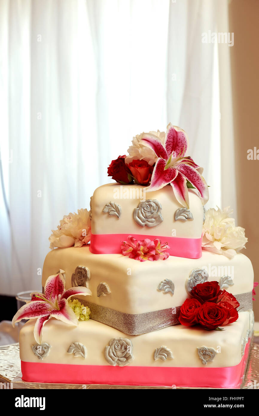 A traditional and decorative wedding cake at wedding reception Stock ...