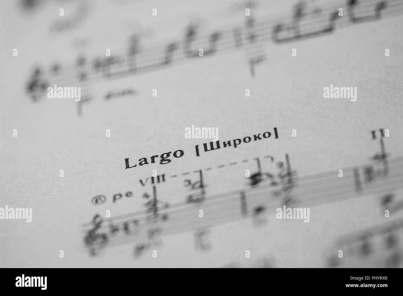 Musical tempo 'Largo' in a music book close up Stock Photo