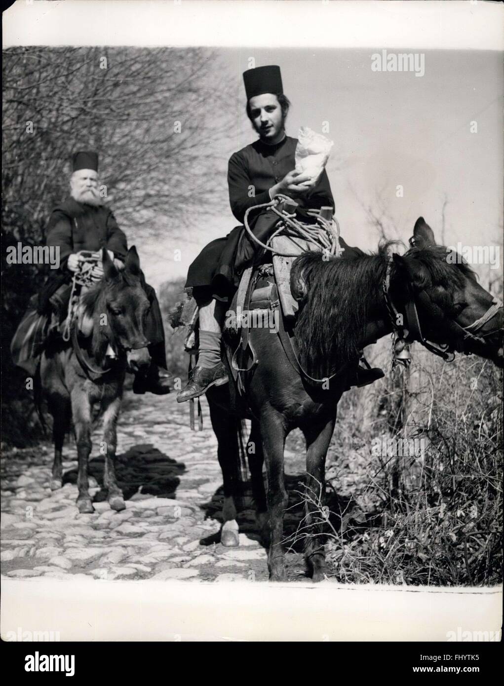 1967 - Athos- Monastery Republic : An upper - class Monk riding, his mule  preceded by his strikingly handsome hair - apparent or ''parayos''. This  Monk is an ''epitropi'' (Committee man) one