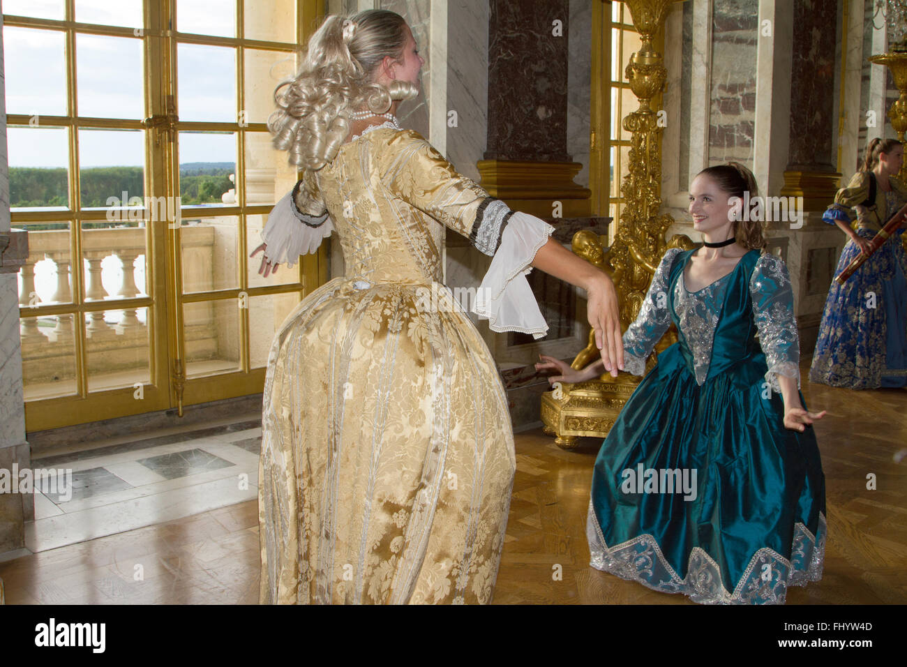 Court dances performed at the Hall of Mirrors Versailles France Stock Photo