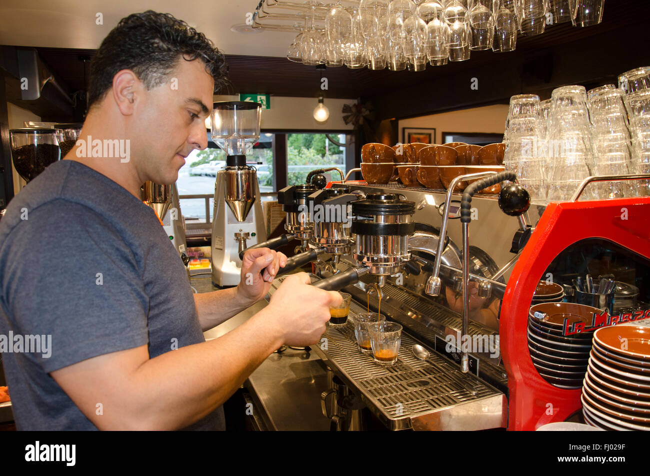 A Barista working in a cafe in Sydney Stock Photo Alamy