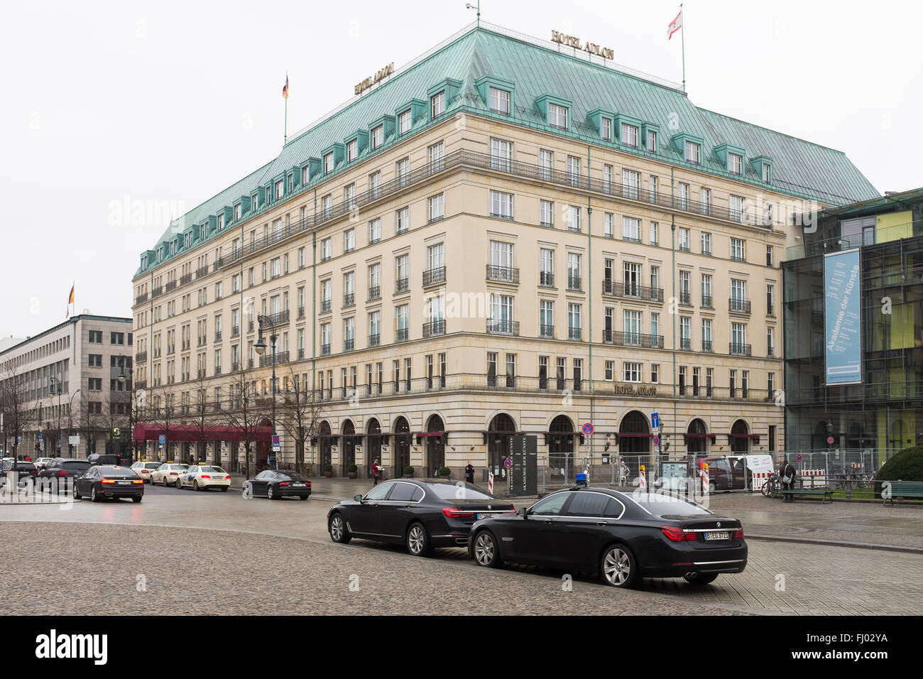 BERLIN, FEBRUARY 26: The Adlon Hotel and german official vehicles in the Brandenburger Tor in Berlin Mitte on February 26, 2016. Stock Photo