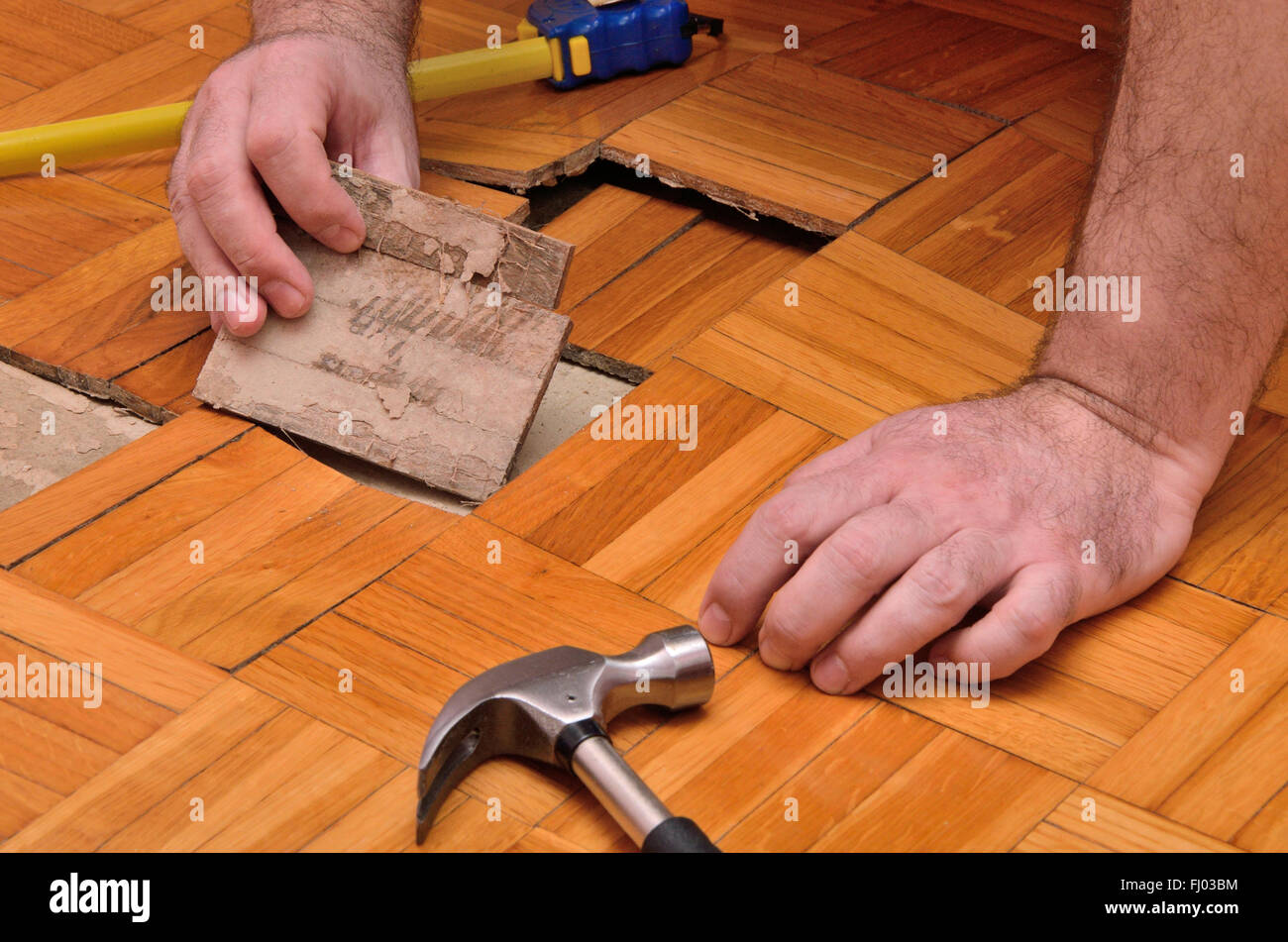 Fixing Wooden Floor Damaged By Moisture Or Water Stock Photo