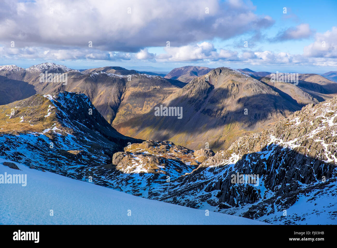 View north  from Scafell Pike in the English Lake District National Park towards Great Gable, winter Stock Photo