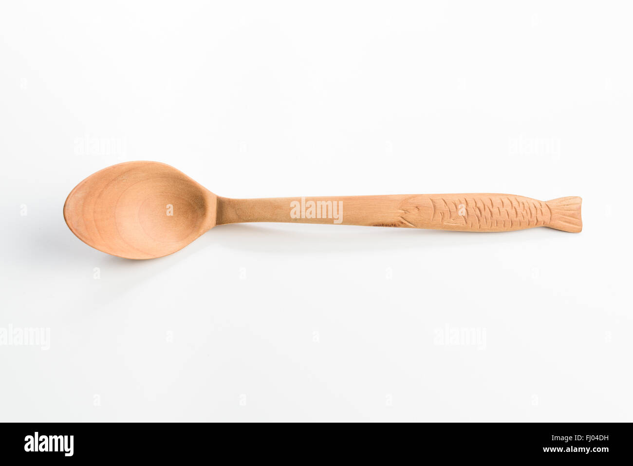 Wooden spoon on white background Stock Photo - Alamy