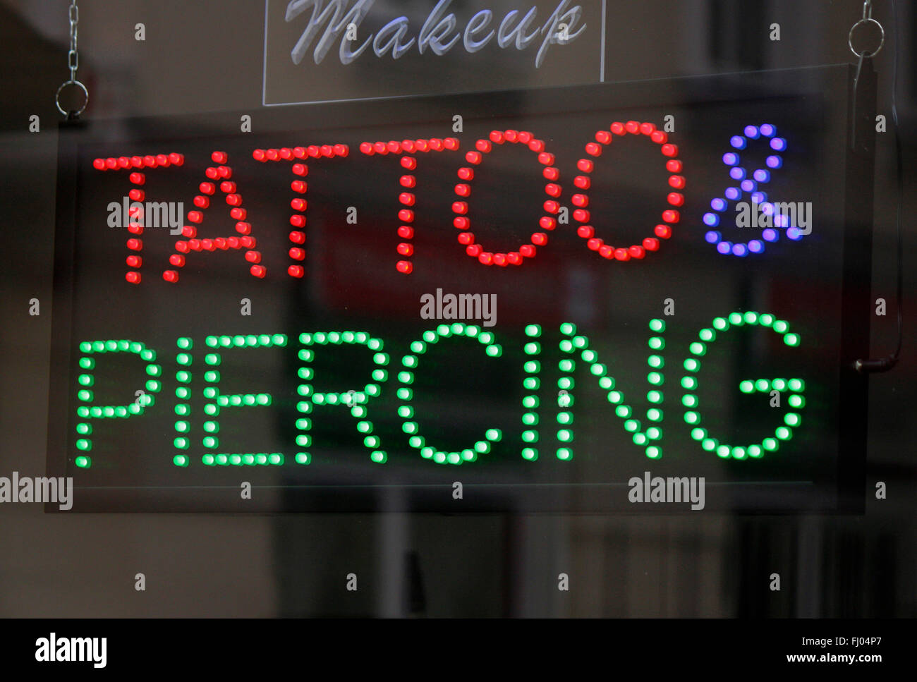 Markenname: 'Tattoo und Piercing', Berlin. Stock Photo