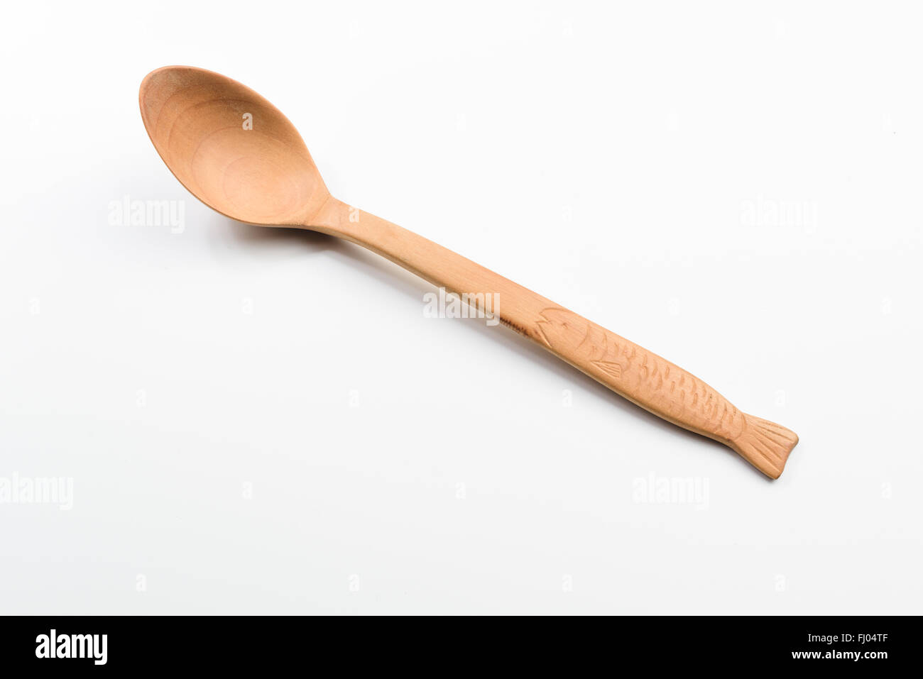 Wooden spoon on white background Stock Photo - Alamy