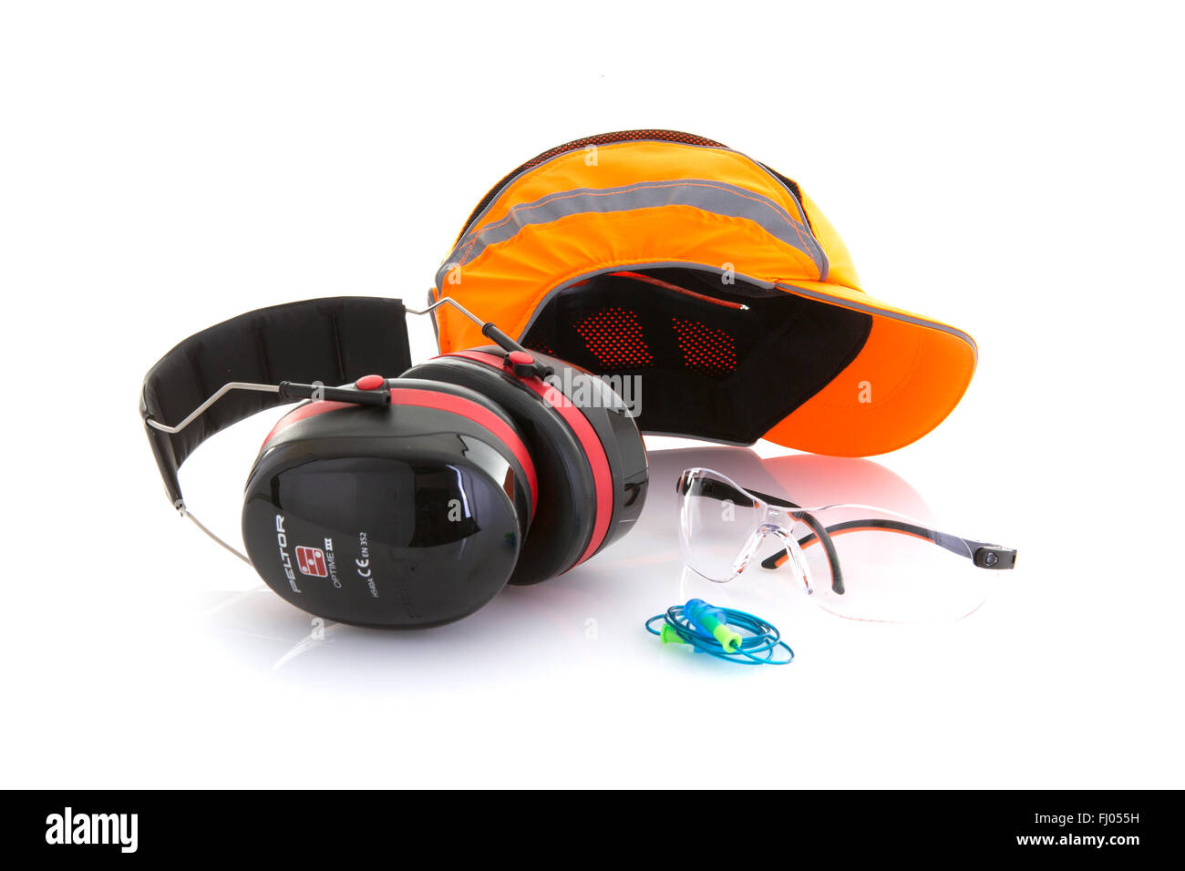 Orange Bump Cap Safety Hat with Ear Defenders, Ear Plugs and safety glasses on a White Background Stock Photo