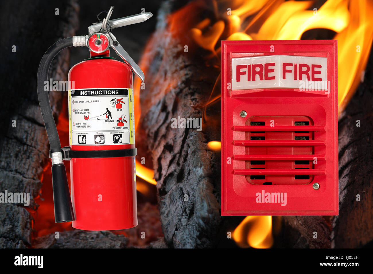 fire extinguisher and horn alarm  over a flames background Stock Photo