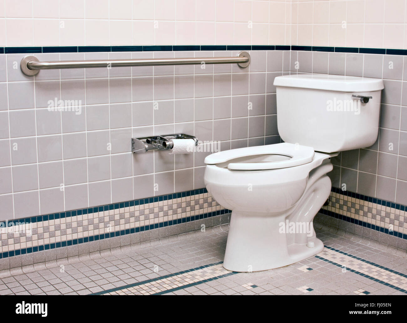 handicap bathroom with grab bars and ceramic tile Stock Photo Alamy