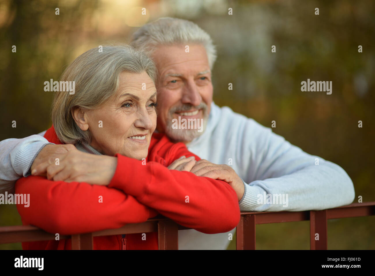 Senior couple in autumn park Stock Photo - Alamy