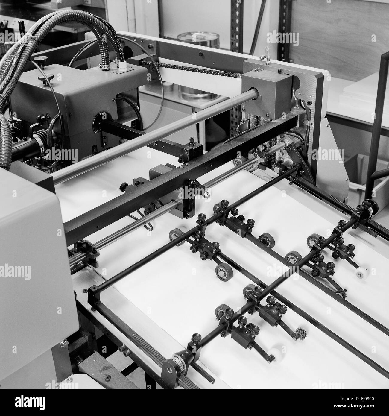 Detail shot in Black and white of the workings of a printing factory. Stock Photo