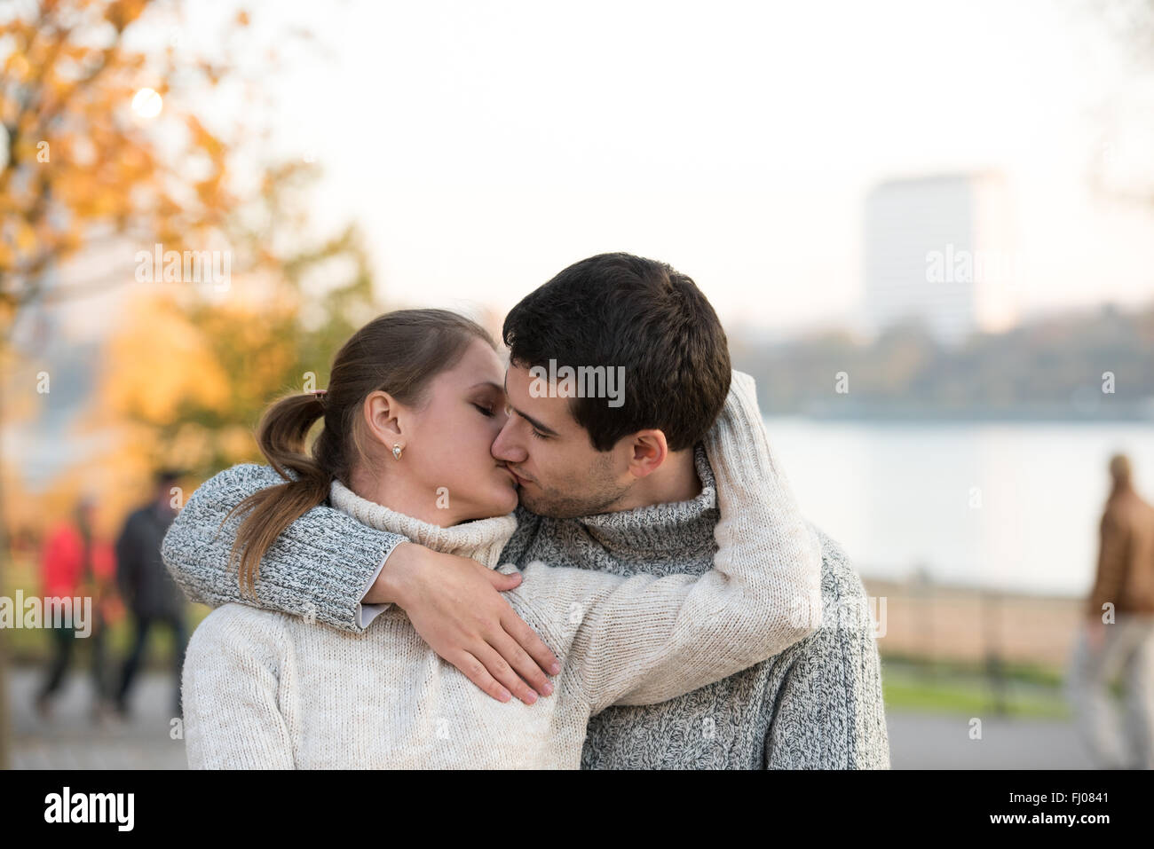 Young romantic couple hugging kiss hi-res stock photography and images ...