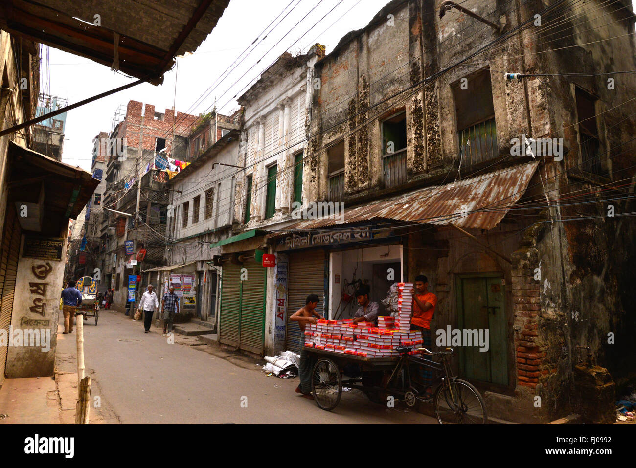 Peoples are walking on the street of old town in Dhaka city. Old town